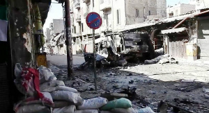 Bombed_out_vehicles_Aleppo.jpg